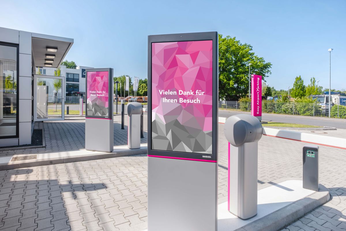 Uitgang met parkeerslagboomterminal