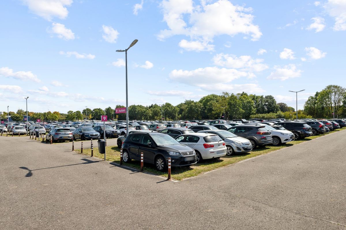 Parked cars at the Easy Airport Parking parking lot at Weeze Airport (NRN)